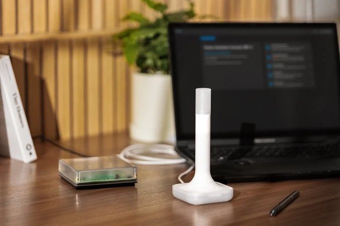 Home Assistant Connect ZBT-2 beside a laptop and Green hub; host sold separately