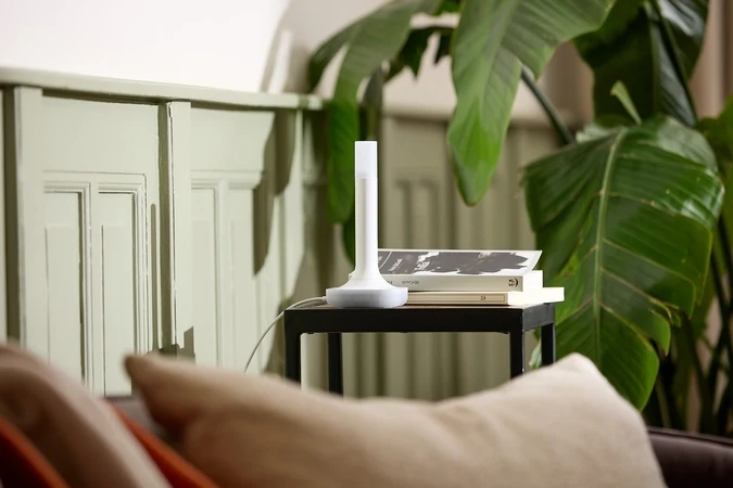 Home Assistant Connect ZBT-2 positioned on a side table